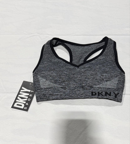 DKNY Sport Medium Impact Seamless Mesh-Back Sports Bra in a heathered grey and black colorway.