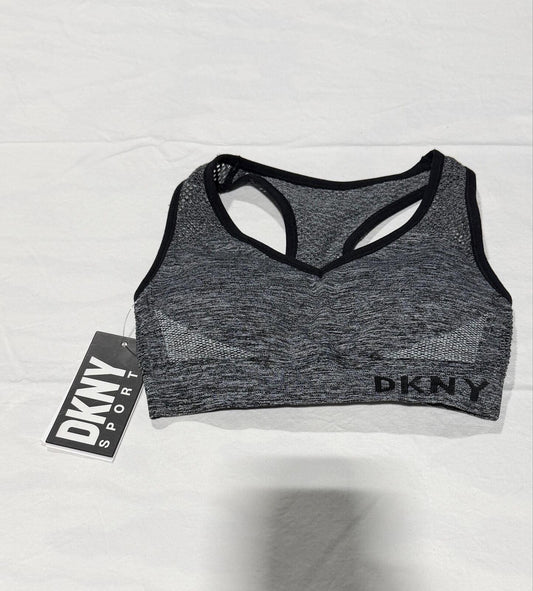 DKNY Sport Medium Impact Seamless Mesh-Back Sports Bra in a heathered grey and black colorway.
