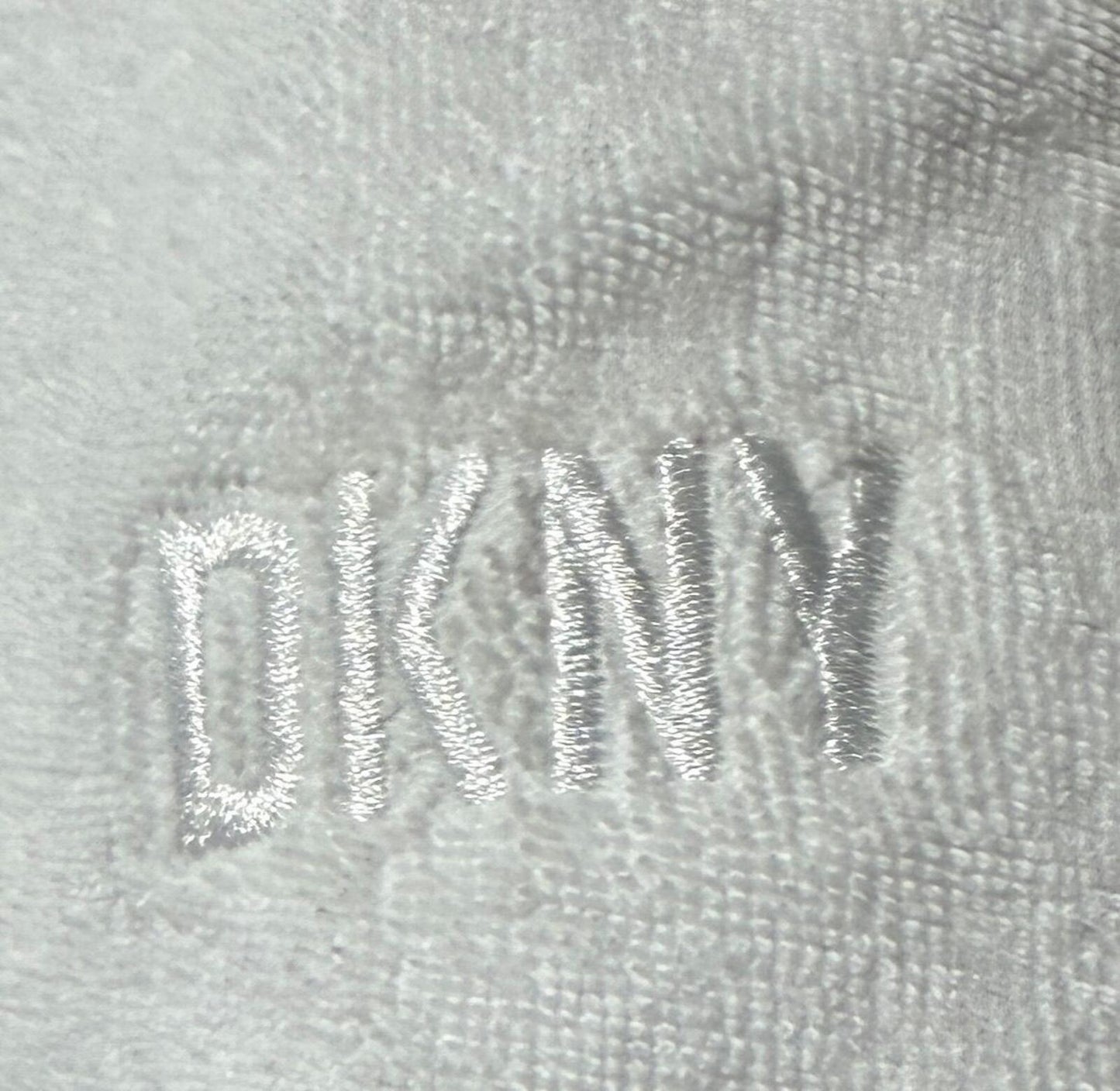 DKNY Sport Women's Terry Cloth Relaxed Shorts in white.