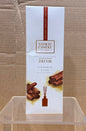 Yankee Candle reed diffuser packaging for Cinnamon Stick scent with illustrations of cinnamon sticks.