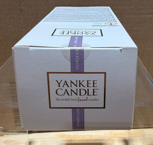 Top view of Yankee Candle packaging showing brand name and product details.