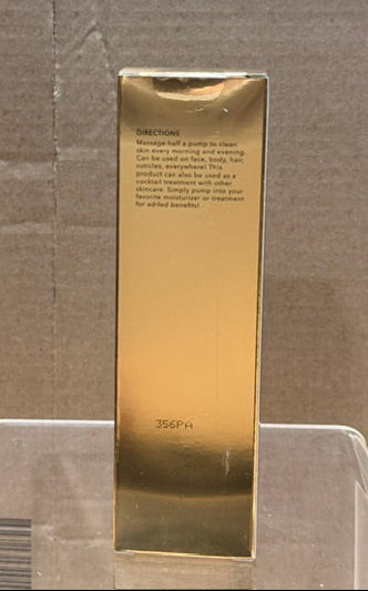 Back view of Nakery SkinInfusion Power-Blend Serum Elixir box with directions for use printed on it.