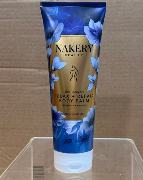 Front view of Nakery SkinRecovery Relax + Repair Body Balm tube, showcasing floral design and product details.