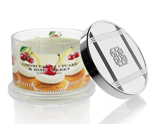 Limoncello Cupcake & Bing Cherry scented candle in a glass container with a silver lid.