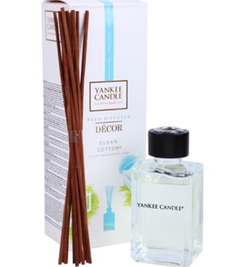 Yankee Candle Reed Diffuser with Clean Cotton scent, glass bottle, and reed sticks displayed beside the packaging.