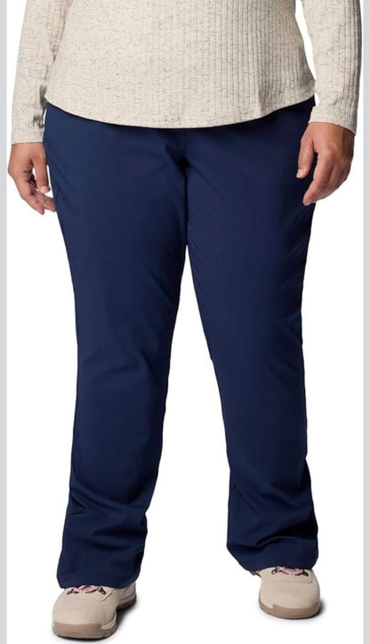 Columbia Women’s All Seasons Bootcut Pants in the "Nocturnal" (navy blue) colorway.